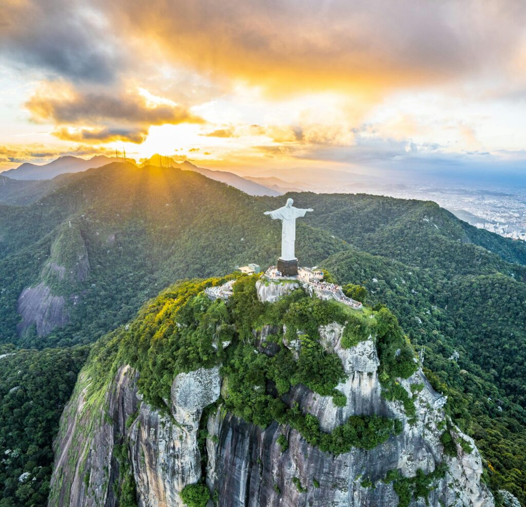 Aerial view of Christ the Redeemer statue at sunset in Rio de Janeiro, Brazil.
