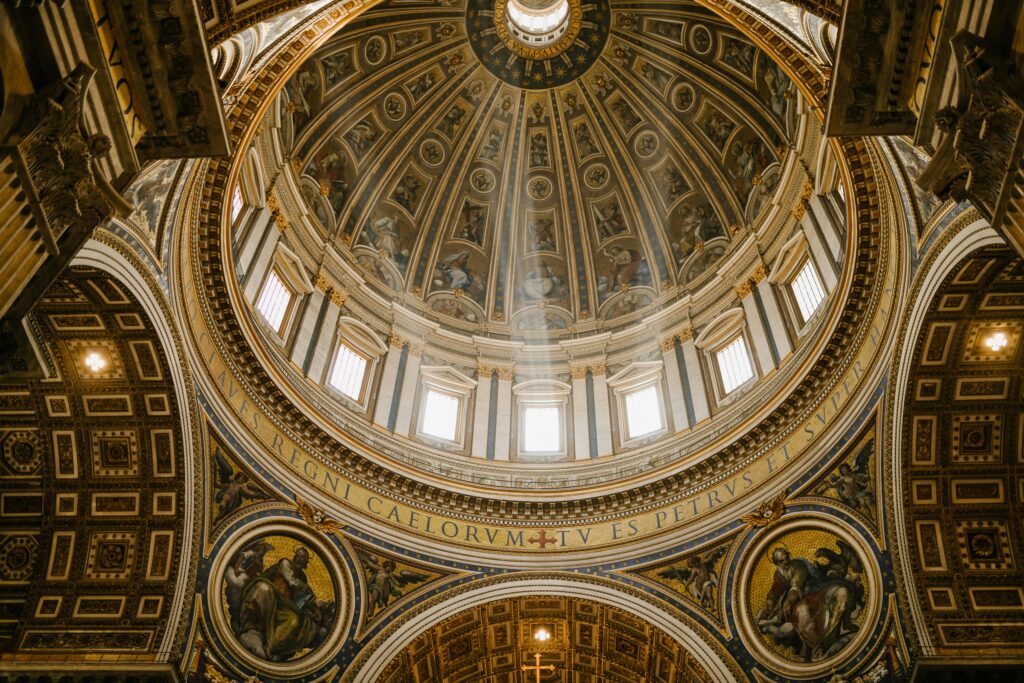 pexels-photo-5273638-5273638 Low angle impressive design of dome with fresco paintings and golden ornamental elements in famous Catholic Saint Peters Basilica in Rome